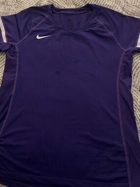 Nike women’s Purple Performance Short Sleeve Jersey with White Swoosh